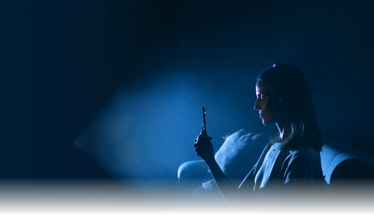 Woman using the Lumenate app