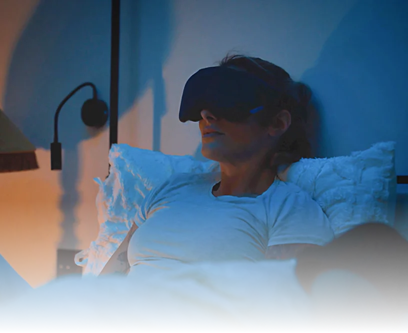 Woman using Lumenate before sleep